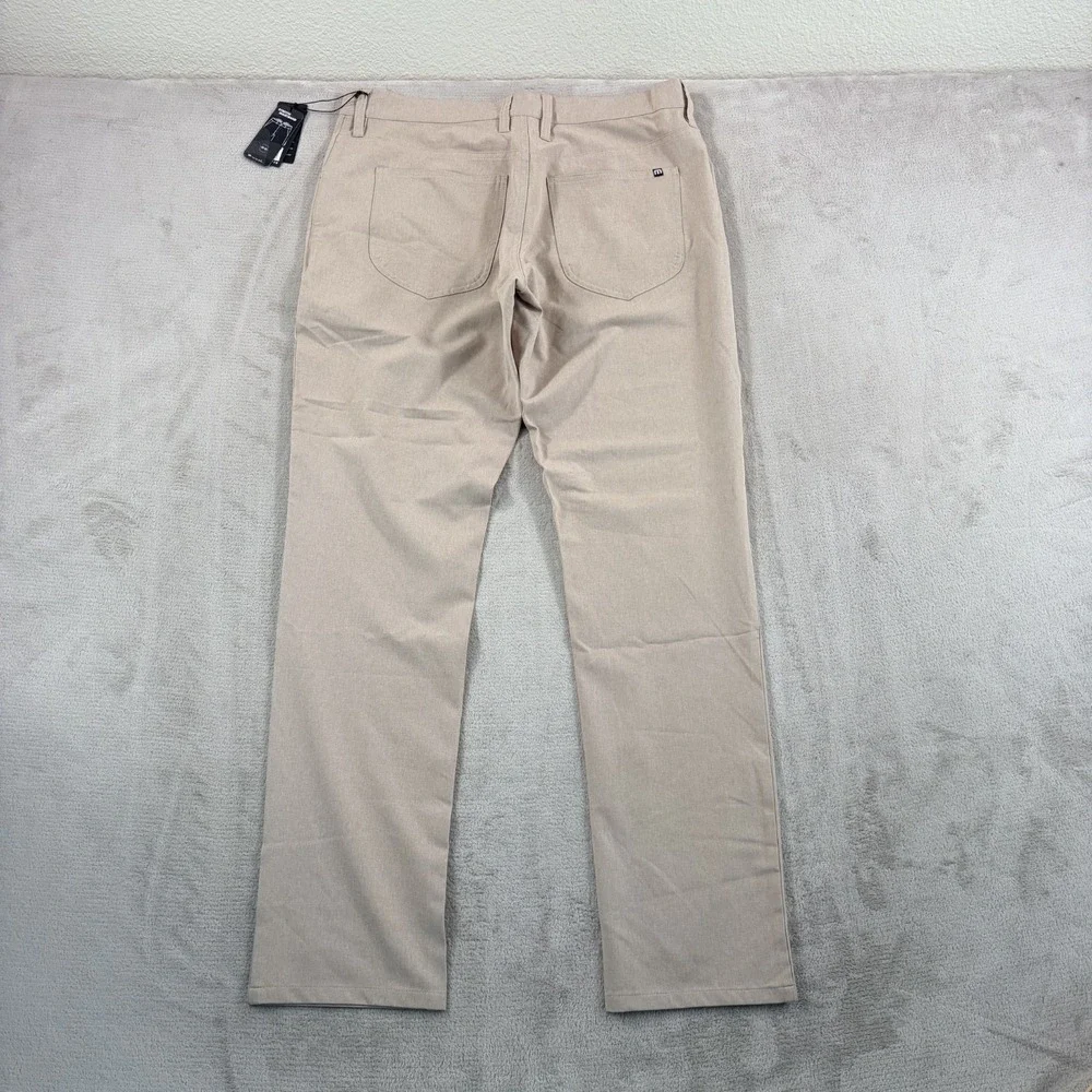 Travis Mathew Open to Close Golf Performance Pants in Khaki Men 34x32 Tag 33 NWT